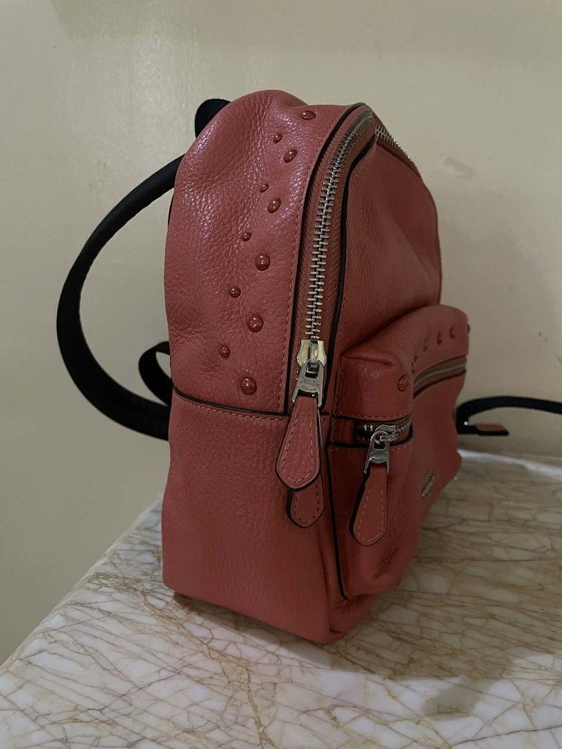 Authentic COACH Mini Charlie Backpack With Studs (Category: Luxury Bags & Wallets) located in Las Pinas. Submitted by lenaa43___ (Listing ID 1406848829, Image 2). Description: - Originally Bought From Japan. 🇯🇵 - Good condition MOP: Gcash MOD: J&T.