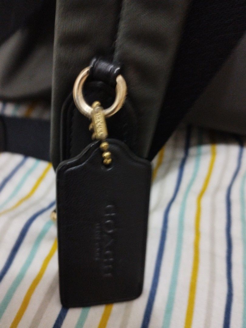 Coach Signature Backpack (Category: Luxury Bags & Wallets) located in Caloocan City. Submitted by shopaholic_cousins (Listing ID 1406915109, Image 3). Description: - Authentic Coach backpack - Signature Coach pattern - Front zippered pocket - Top handle - Adjustable shoulder straps - Zippered main compartment - Includes Coach hang tag - Includes care instructions - Coach label inside.