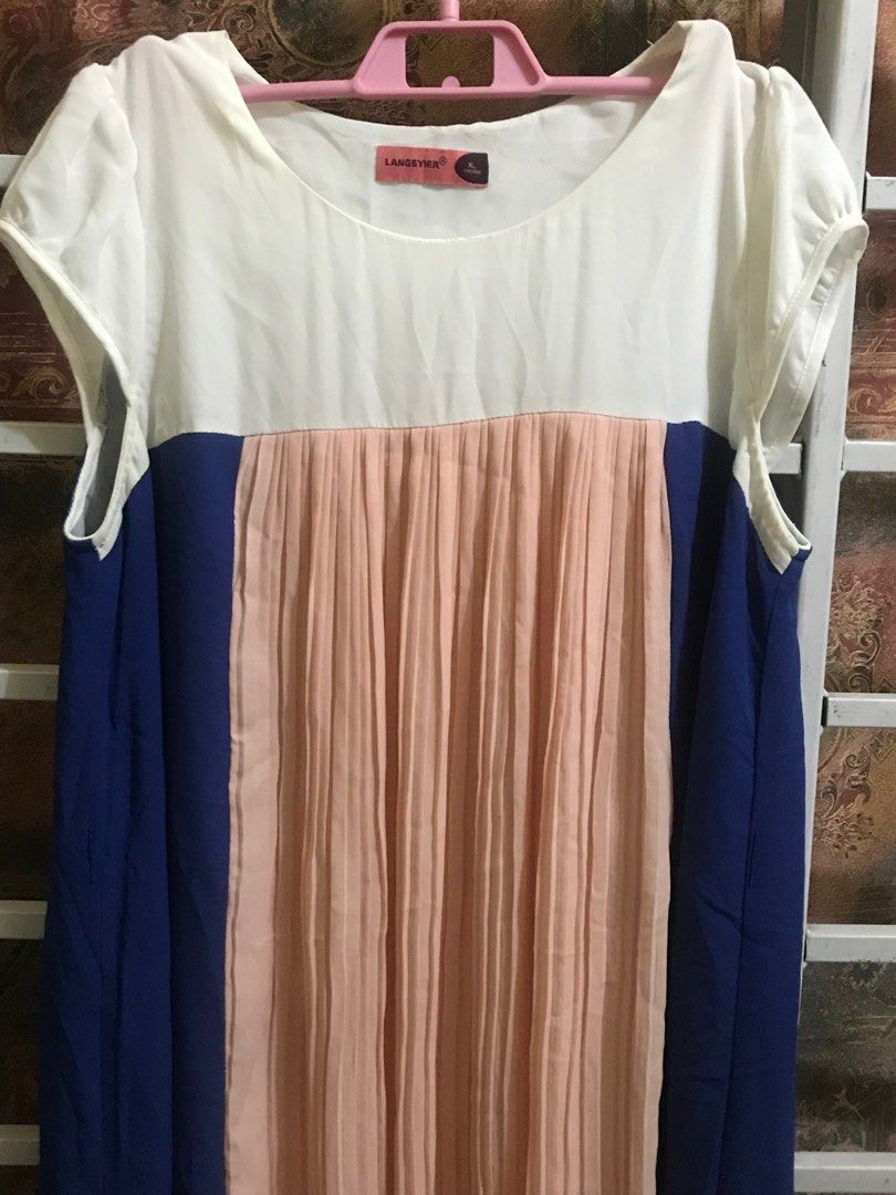 Color Block Dress - XL (Category: Dresses) located in Cavite. Submitted by orchidaes (Listing ID 1406946098, Image 1). Description: Dress features a color block design with white, blue, and peach panels. It has short sleeves and a round neckline. The brand is Langsyier, and the size is XL. The dress has a pleated peach center panel. It is suitable for casual wear..
