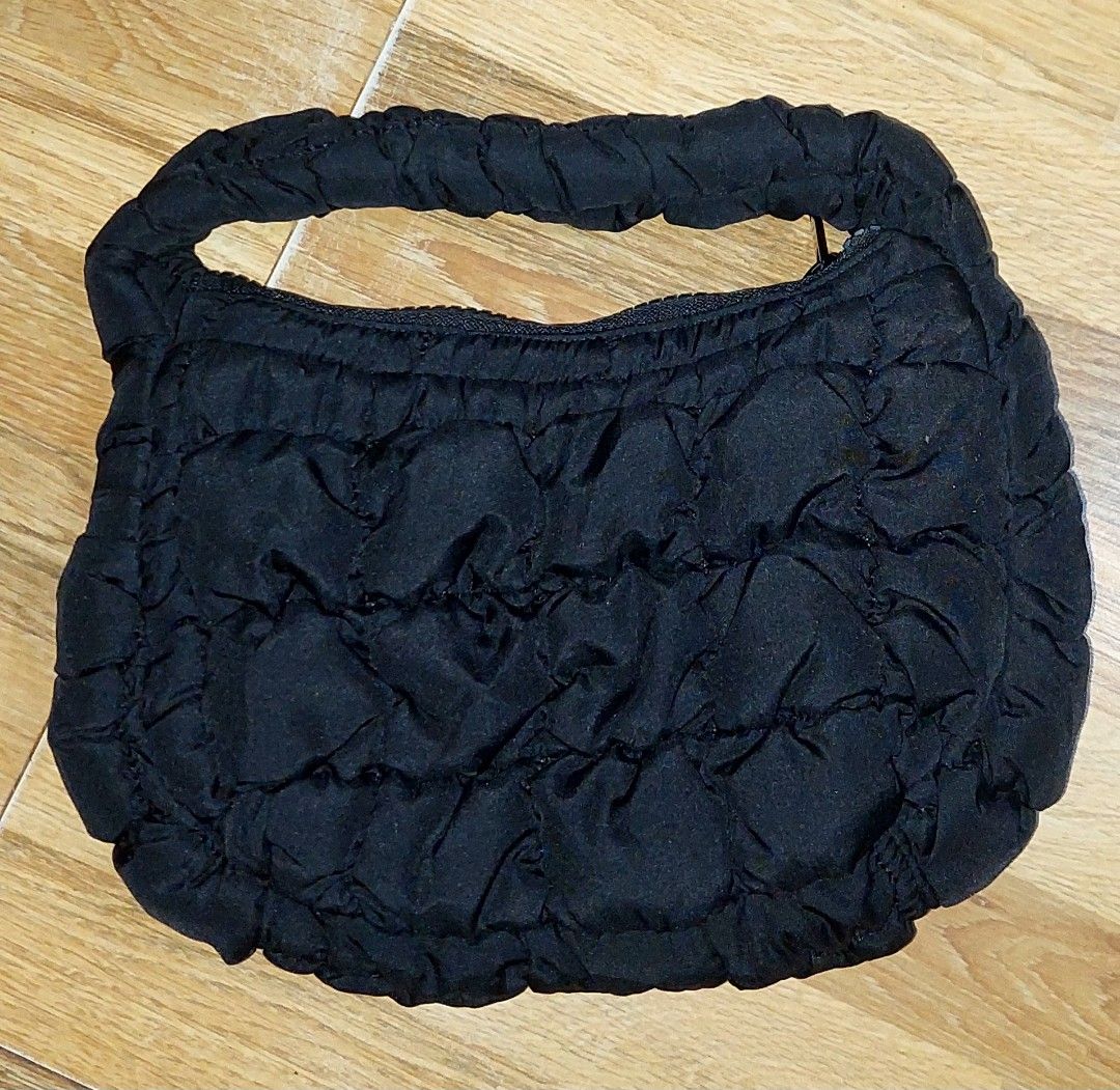 COS Quilted Handbag (Category: Luxury Bags & Wallets) located in Puerto Princesa. Submitted by YeSurJOMS (Listing ID 1406944429, Image 2). Description: - COS black quilted handbag - Single handle - Zippered closure - Lined interior - Unique quilted design - Includes COS tag.