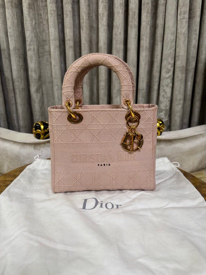 Dior Lady Medium Textured Bag Authentic (Category: Luxury Bags & Wallets) located in Makati City. Submitted by happyprelovedph (Listing ID 1324134924, Image 2). Description: Rank A With Dust bag and Strap Like New Condition Moneyback if proven fake.