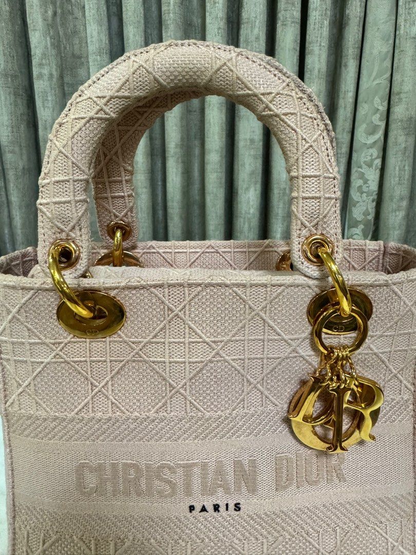 Dior Lady Medium Textured Bag Authentic (Category: Luxury Bags & Wallets) located in Makati City. Submitted by happyprelovedph (Listing ID 1324134924, Image 3). Description: Rank A With Dust bag and Strap Like New Condition Moneyback if proven fake.