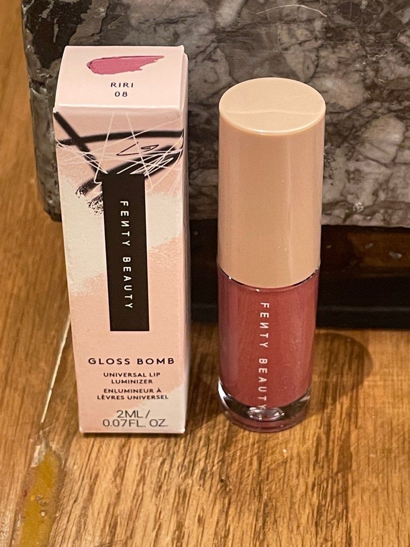 Fenty beauty gloss bomb riri 08 2 ml (Category: Makeup) located in Quezon City. Submitted by chic_styleph (Listing ID 1406965521, Image 2). Description: IRRESISTIBLE SHINE, NOURISHING WEAR. UNIVERSAL FINISHING TOUCH. STRAIGHT UP: The ultimate gotta-have-it lip gloss with explosive shine that feels as good as it looks-Fenty Beauty Gloss Bomb is the essential finishing touch to your Fenty Face. THE LOWDOWN: The stop-everything, give-it-to-me lip gl
