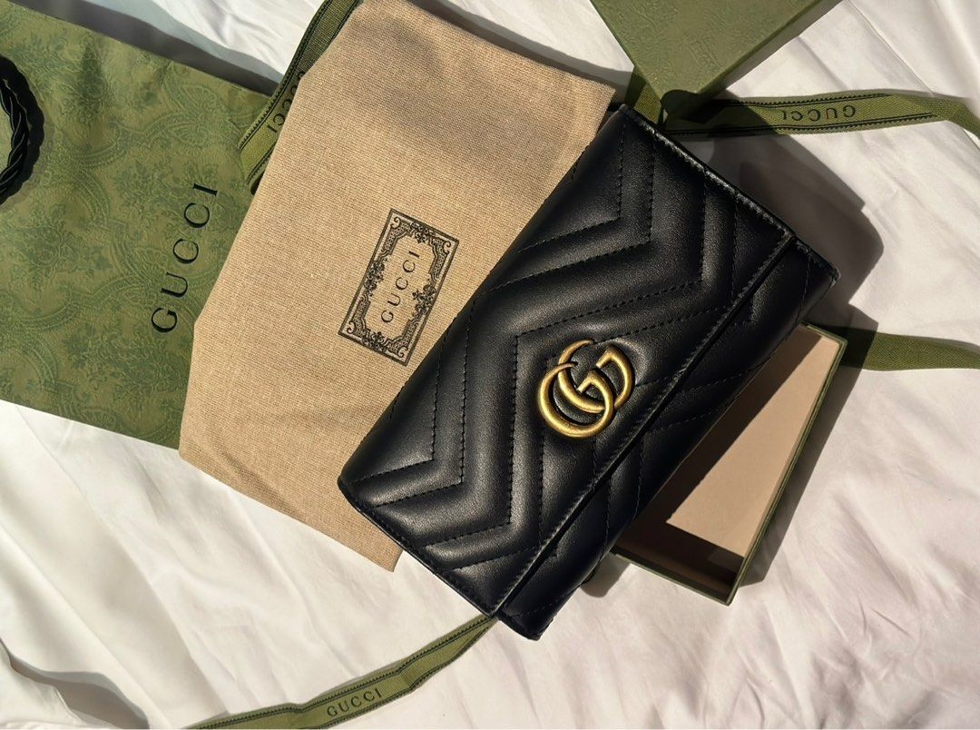 Gucci Marmont Matelassé Leather Wallet (Category: Luxury Bags & Wallets) located in Manila. Submitted by danicaacolladoo (Listing ID 1406956317, Image 2). Description: - Authentic Gucci Marmont wallet - Black matelassé leather - Iconic GG logo - Includes original box, dust bag, and shopping bag.