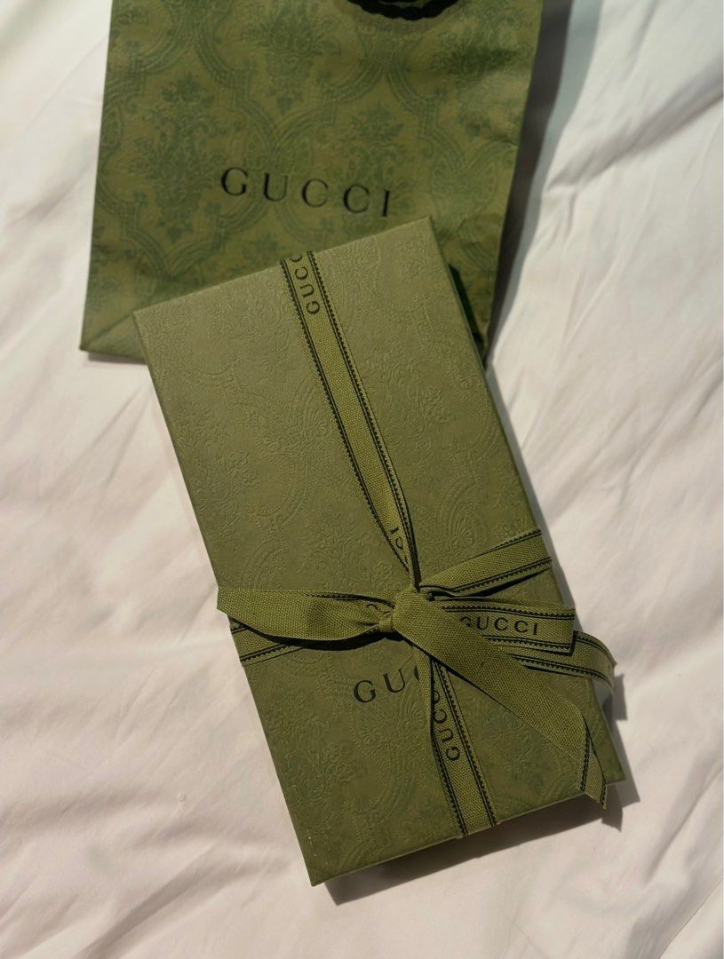 Gucci Marmont Matelassé Leather Wallet (Category: Luxury Bags & Wallets) located in Manila. Submitted by danicaacolladoo (Listing ID 1406956317, Image 1). Description: - Authentic Gucci Marmont wallet - Black matelassé leather - Iconic GG logo - Includes original box, dust bag, and shopping bag.