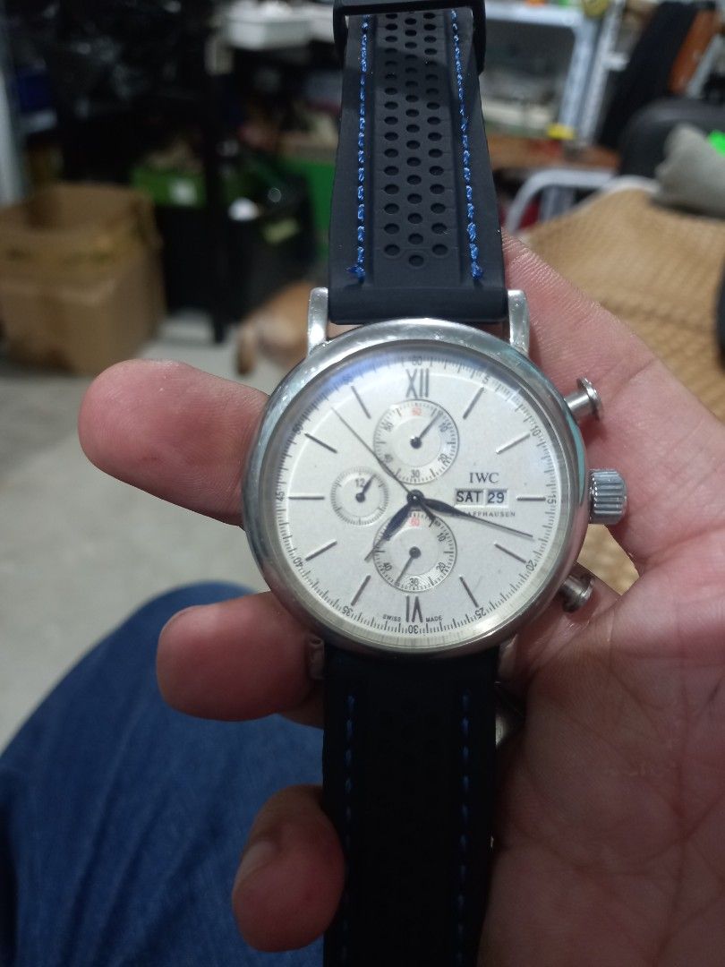 IWC Watch with Chronograph analog (Category: Luxury Watches) located in Subic. Submitted by regiegabriel29 (Listing ID 1406936427, Image 1). Description: - IWC Chronograph Watch - Silver dial with chronograph subdials - Date display - Stainless steel case - Black strap (leather and rubber combination) - Detailed case back - Includes crown and two pushers add sf 150.
