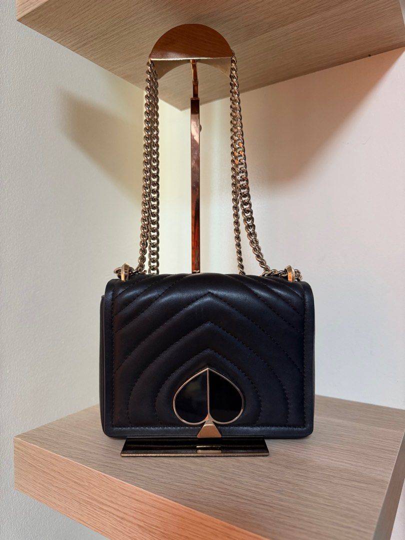 Kate Spade Amelia (Category: Luxury Bags & Wallets) located in Marikina City. Submitted by sushmitamayc (Listing ID 1406863587, Image 1). Description: - Kate Spade shoulder bag - Black quilted design - Gold-tone chain strap - Convertible Chain Strap - Spade logo detail - Made of leather.