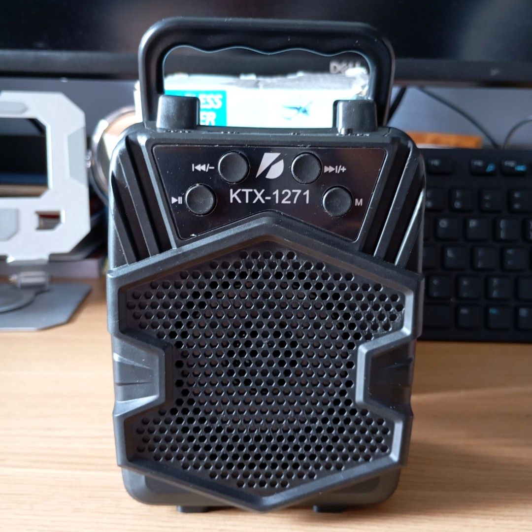KTSX 3" Wireless Speaker (Category: Soundbars, Speakers & Amplifiers) located in Quezon City. Submitted by ana-chan (Listing ID 1406848213, Image 3). Description: Portable KTS-1271 wireless speaker with a 3" speaker drive. Features include wireless connectivity, USB/TF card support, AUX function, and a rechargeable battery. It also has a karaoke function and FM radio. The speaker has a play time of up to 1 hour at 75% volume and a charging time o