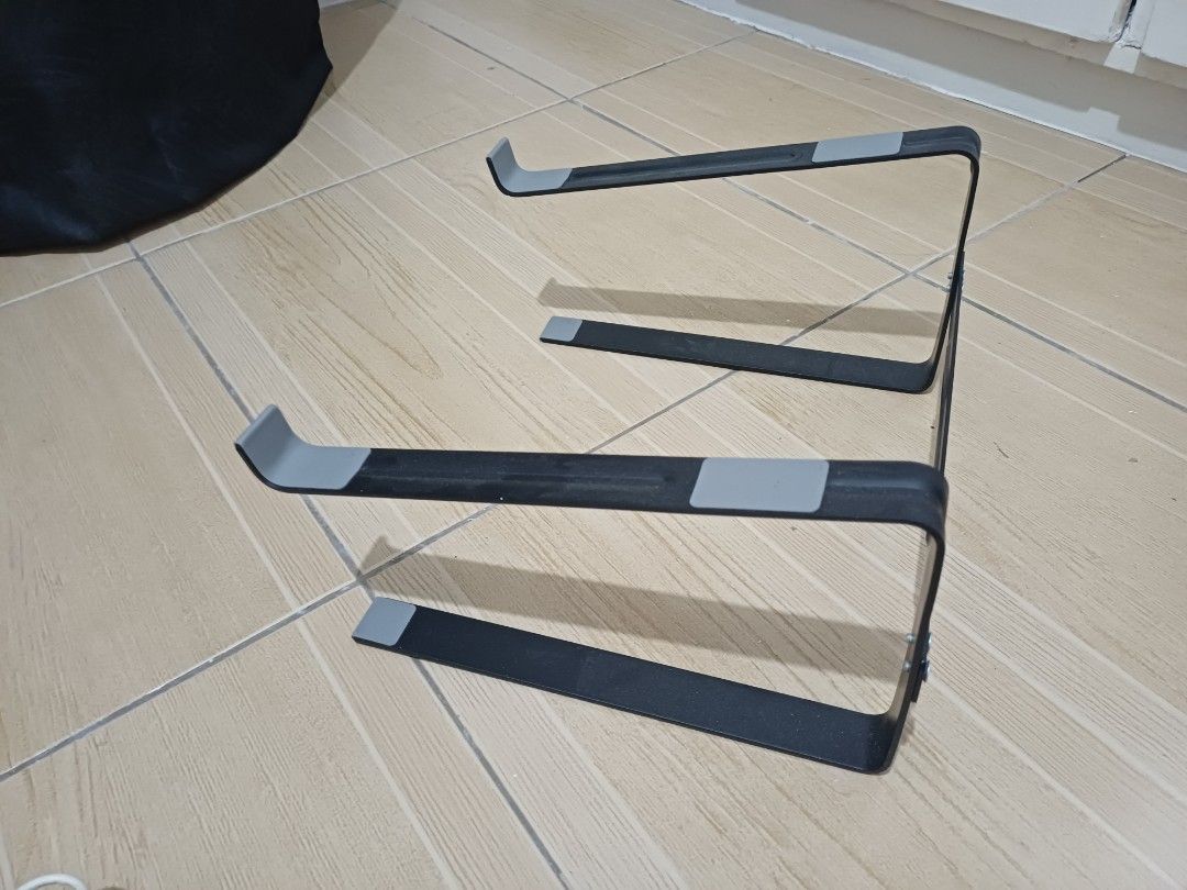 Laptop Stand - Various Designs (Category: Laptop Bags & Sleeves) located in Paranaque City. Submitted by potatoiceblended (Listing ID 1406873809, Image 1). Description: - Black metal stand with gray accents - Pair of wooden stands - Foldable black plastic stand - Elevates and angles your laptop - Improves ergonomics - Enhances airflow.