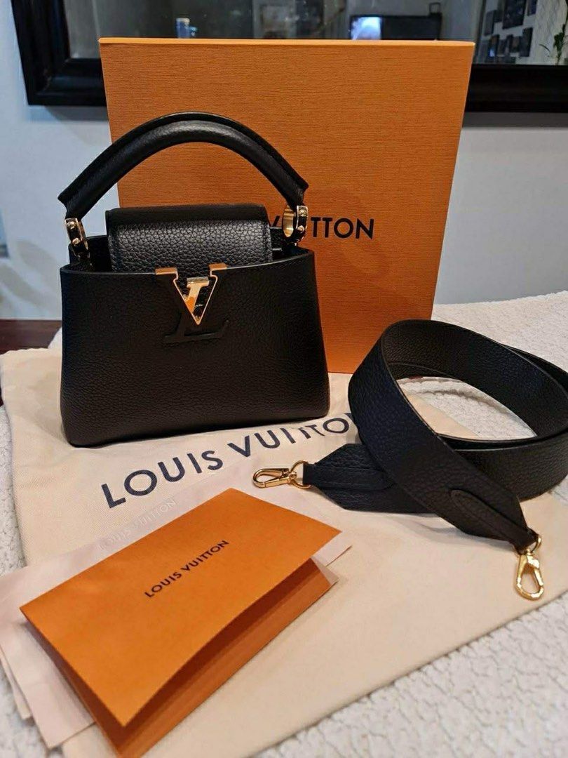 Louis Vuitton Capucines Mini Black Authentic (Category: Luxury Bags & Wallets) located in Makati City. Submitted by happyprelovedph (Listing ID 1406854707, Image 1). Description: Bought in US Complete Almost New No Flaws.