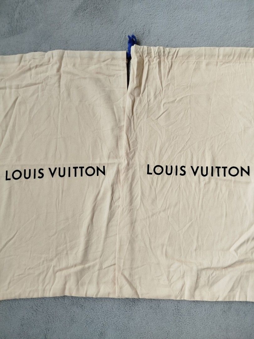 Louis Vuitton Dust Bag 2 for (Category: Luxury Bags & Wallets) located in Calamba. Submitted by merrymerida (Listing ID 1406886688, Image 1). Description: - Authentic Louis Vuitton dust bag - Beige fabric - Drawstring closure - Dimensions: Approximately 21 inches (height) x 14 inches (width) - Material: 100% cotton.