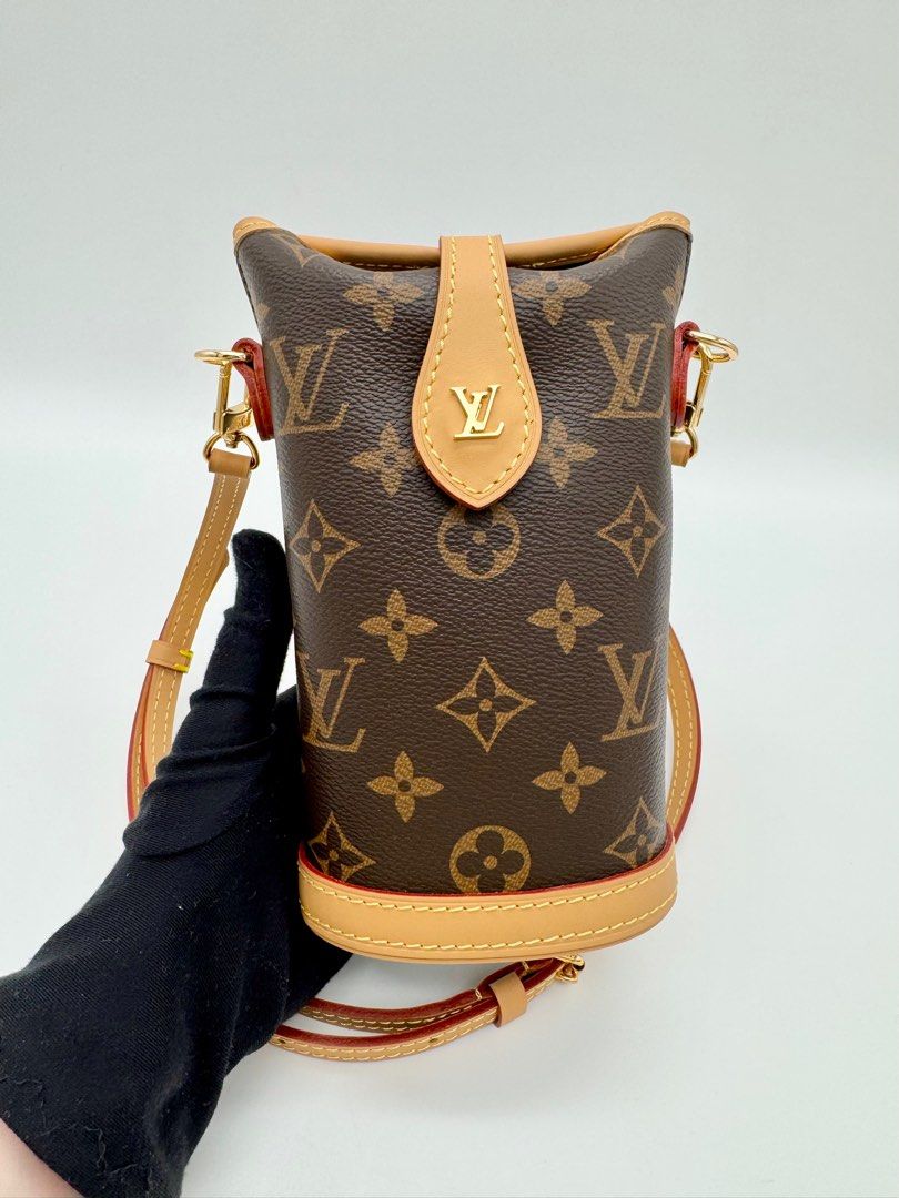 LV Fold Me Pouch Phone Bag (Category: Cross-body Bags) located in Calauan. Submitted by giftbags (Listing ID 1406820620, Image 2). Description: ❗️PLEASE READ CAREFULLY ❗️ LV Fold Me Pouch Phone Bag L ‭14.5 x H 18 x W 6.5 cm ‬ With Dust Bag STILL AVAILABLE/ONHAND? Yes. Item not marked as sold means available… 📌NO COD 📌NO LALAMOVE/GRAB 📌NO WHEN WORN 📌ITEMS ARE FOR SHIPPING ONLY - CUT OFF 12nn 📌ALL SALES ARE FINAL “WHAT’S YOUR LAST/LOWEST PRICE