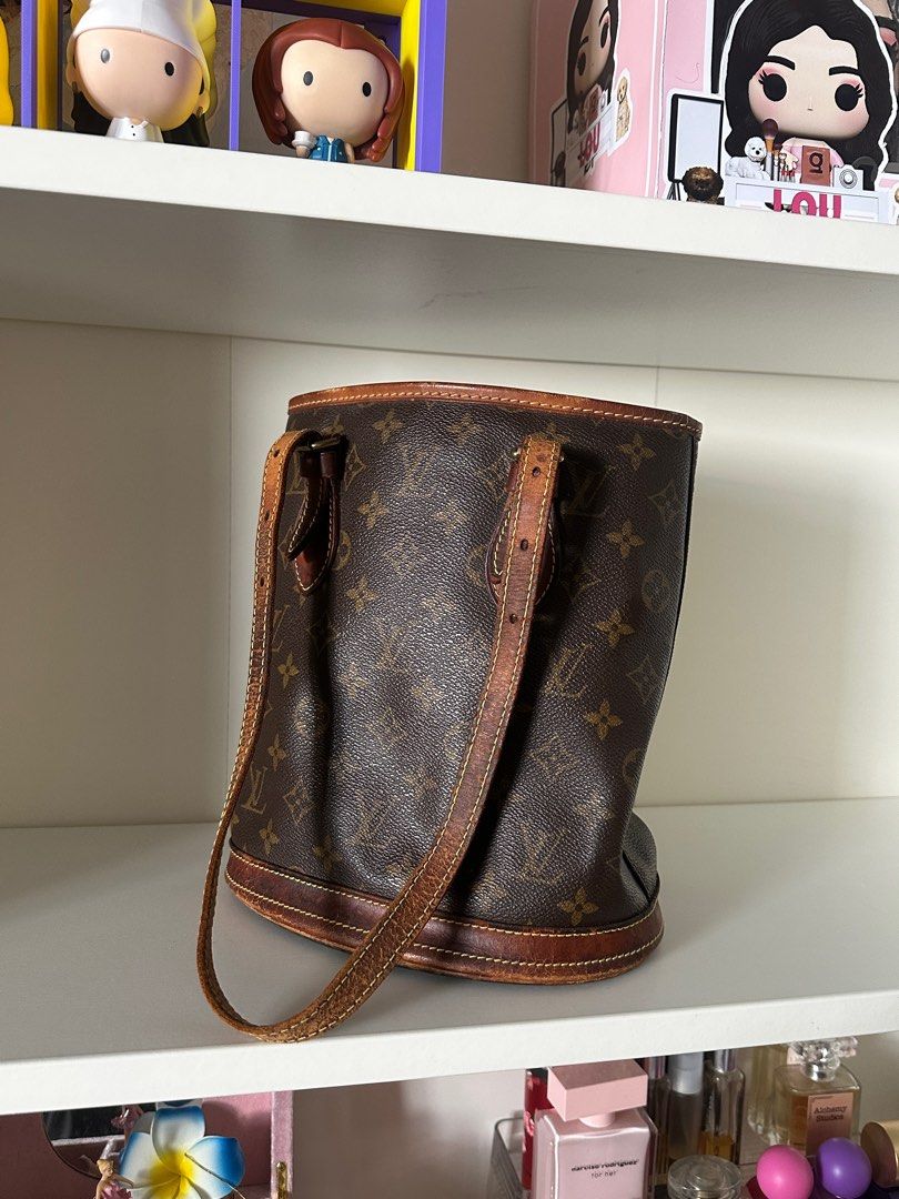 REPRICED LV Vintage Monogram Bucket (Category: Luxury Bags & Wallets) located in Quezon City. Submitted by makeupmatcha (Listing ID 1406837139, Image 1). Description: Bought as is from Japan for 15k Bag only Needs re-lining and new straps SDD via Lalamove/Grab Can do meetup + transpo fee from North QC.