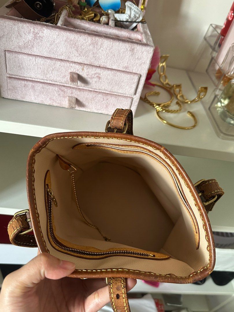 REPRICED LV Vintage Monogram Bucket (Category: Luxury Bags & Wallets) located in Quezon City. Submitted by makeupmatcha (Listing ID 1406837139, Image 3). Description: Bought as is from Japan for 15k Bag only Needs re-lining and new straps SDD via Lalamove/Grab Can do meetup + transpo fee from North QC.