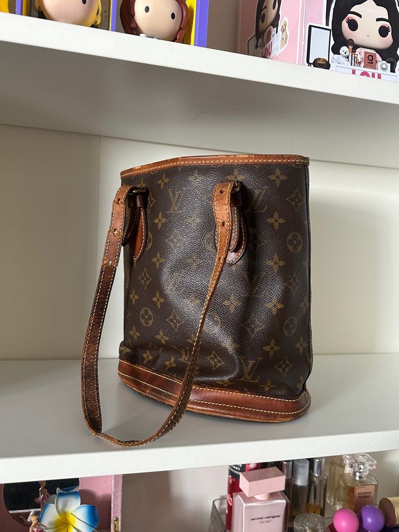 REPRICED LV Vintage Monogram Bucket (Category: Luxury Bags & Wallets) located in Quezon City. Submitted by makeupmatcha (Listing ID 1406837139, Image 2). Description: Bought as is from Japan for 15k Bag only Needs re-lining and new straps SDD via Lalamove/Grab Can do meetup + transpo fee from North QC.