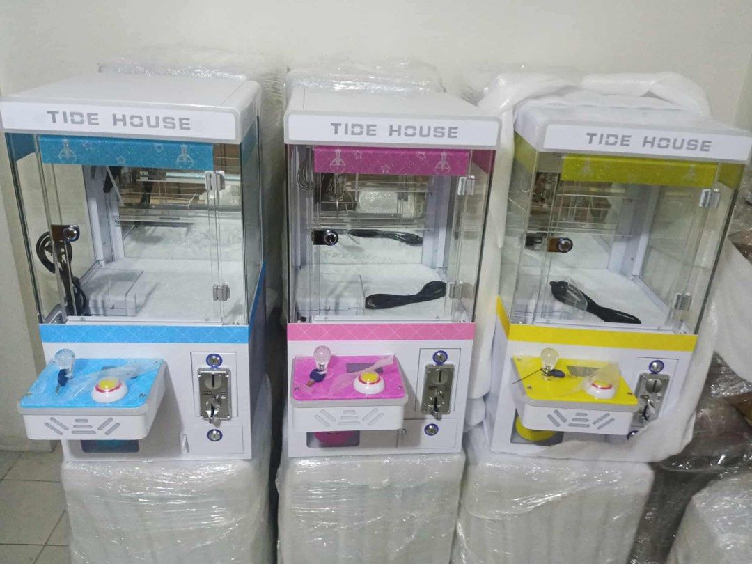 Mini Claw Machine (Category: Interactive Toys) located in Manila. Submitted by from_elle (Listing ID 1406832951, Image 1). Description: ₱26,000 for sale with FREEBIES ALL BRANDNEW ALL COLORS AVAIL: Pink, Blue & Yellow Rental Rate: ₱2,100/ 5 hours Exceed: ₱650 / hour Details: W40cm x D55cm x H78cm 25kgs.
