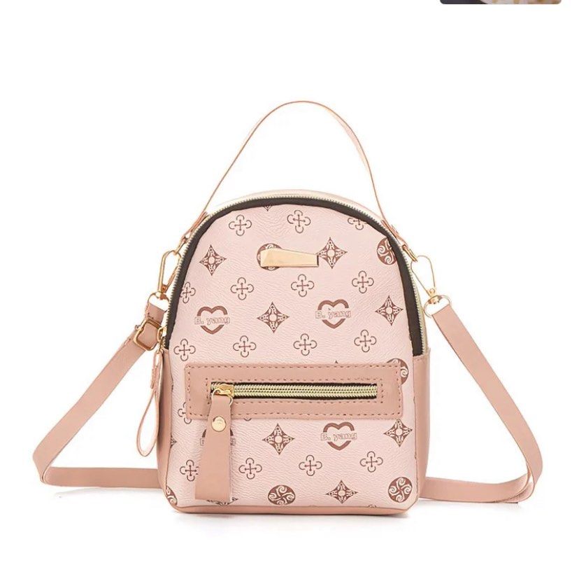 Miniature Patterned Backpack （分類：背囊）位於 Hong Kong。 由 ccgrape122 提交（商品編號 1406848656，圖片 2）。簡介： Stylish mini backpack features a patterned design with a top handle and a detachable shoulder strap. It has a front zippered pocket and a main compartment. The bag is available in multiple colors, including brown, black, and pink. It's perfect for carrying essentials in a compact and fashionable way. Pink is available now!。
