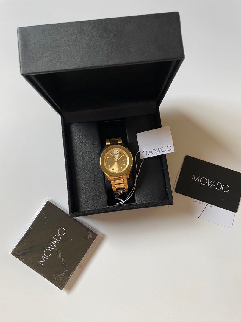 Movado Bold Gold Tone Quartz Watch (Category: Women's Watches) located in Tanza. Submitted by deeclutterer (Listing ID 1406893963, Image 2). Description: MOVADO Bold Gold Tone Steel Women’s Watch 3600416 In immaculate condition With original box, care card, authenticity card from the shop I bought it from -Swiss Made - Gold Dial - Yellow Gold Ion-Plated Bezel - Dot and Index Hour Markers - Movado Dot at 12 O’Clock - Minute Markers Around the Oute