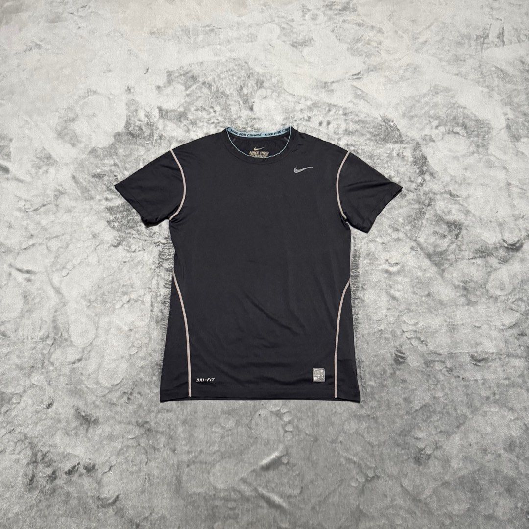 NIKE PRO COMBAT COMPRESSION SHIRT (Category: Activewear) located in Santa Maria. Submitted by rarefindslt (Listing ID 1406855487, Image 1). Description: NIKE PRO COMBAT COMPRESSION SHIRT (SWIPE LEFT FOR MORE DETAILS..) XXL on tag in solid good condition rate! with tags for authenticity, solid stretchable material, side print swoosh logo, dri-fit stretchable material, no issue.
