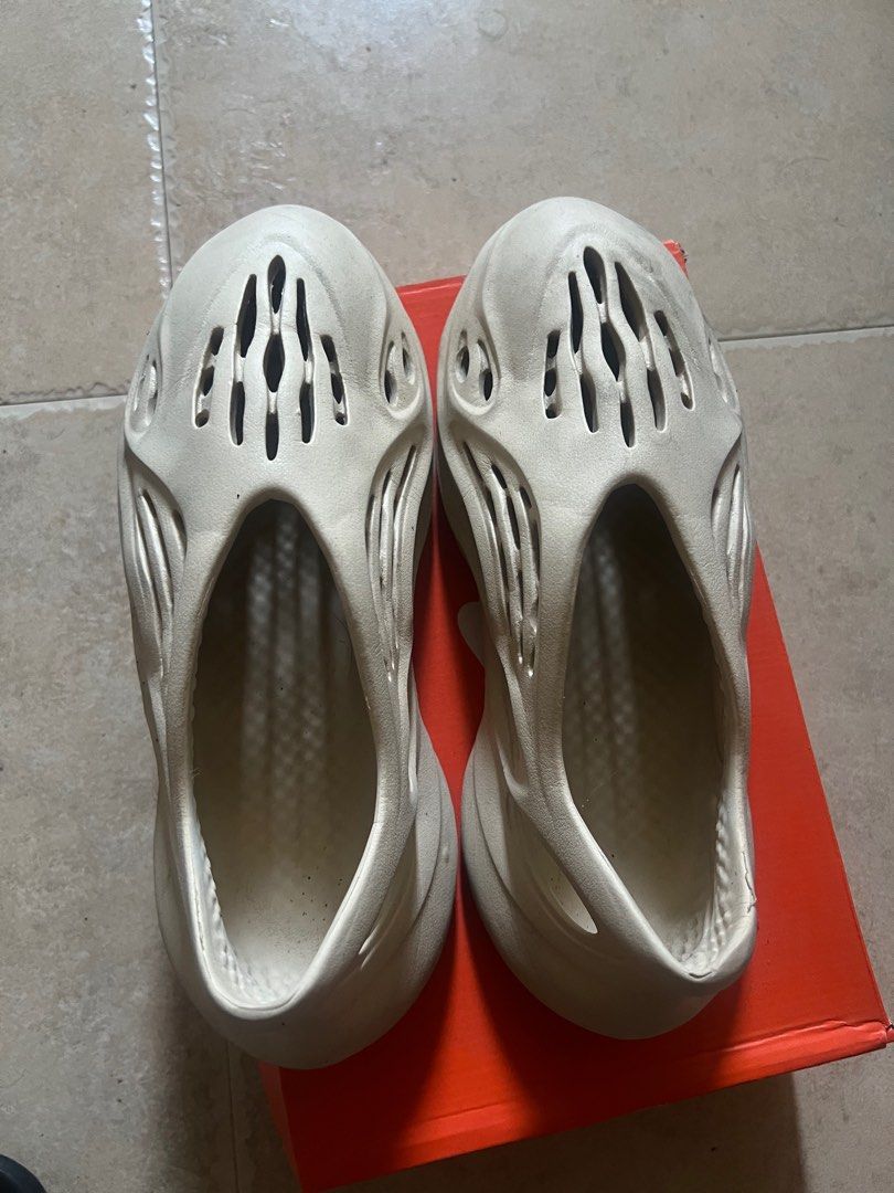 Nike Yeezy Foam Runner (Category: Slippers & Slides) located in Makati City. Submitted by iamruka (Listing ID 1406832580, Image 2). Description: Moving out, need to declutter asap loc: makati - Nike Yeezy Foam Runners - Neutral color - Unique perforated design .
