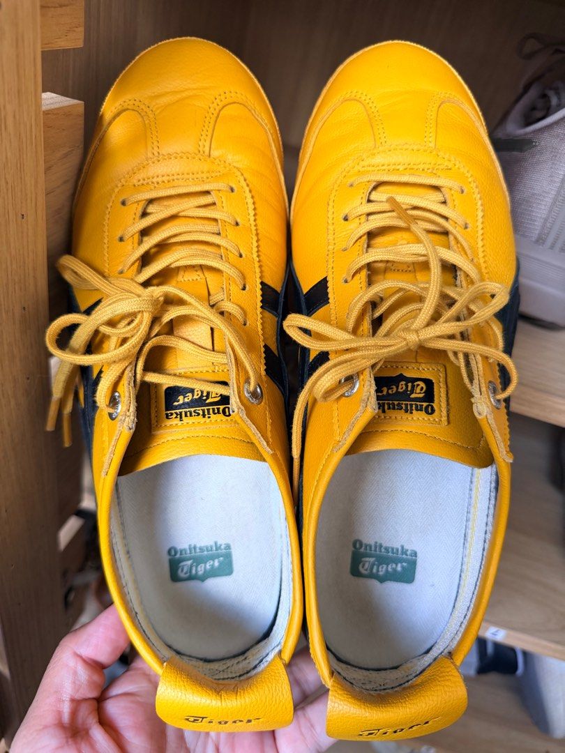 Onitsuka Tiger Mexico 66 Yellow Black Sneakers (Category: Sneakers) located in Singapore. Submitted by icecoolerme (Listing ID 1406904733, Image 2). Description: - Authentic Onitsuka Tiger Mexico 66 - Vibrant yellow and black color - Minimal wear - Comfortable for daily use - Please refer to size chart Size 25cm.