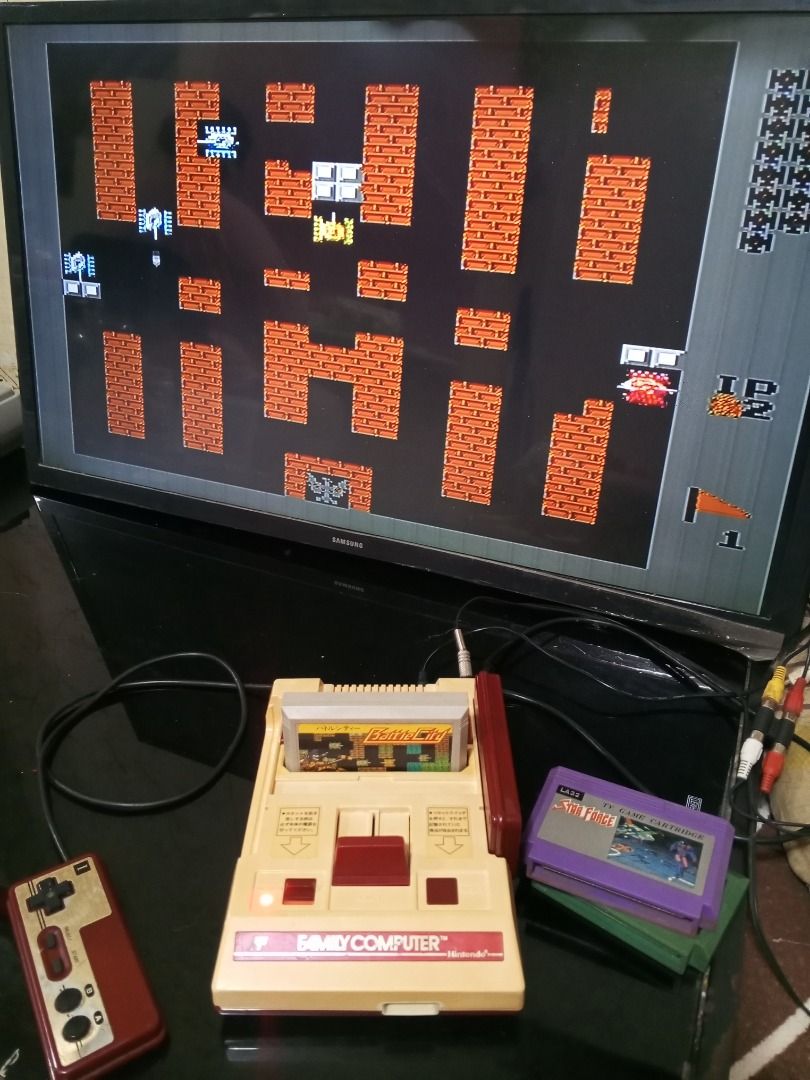 ORIGINAL NINTENDO FAMICOM AV MODDED 220v. (Category: Nintendo) located in Quezon City. Submitted by trashtheprocess (Listing ID 1406909375, Image 2). Description: (#3) 100% ORIGINAL WORKING 🇯🇵 NINTENDO FAMICOM 220V. ✅ MODIFIED UNIT (FF)🇯🇵 ✅ AV MODIFIED ✅ LED LIGHT POWER INDICATOR ( RED ) ✅ 1 POWER BRICK (220v.) ✅ 1 AV CABLE ✅ 3 WORKING GAMES *BATTLE CITY *STAR FORCE *MAGIC JEWELRY *can send sample vids if interested. ❓FEEL FREE TO ASK ANY QUE