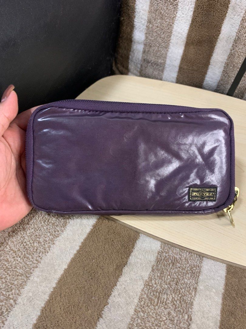 Porter Japan long zipped wallet (Category: Wallets & Card holders) located in Cabanatuan. Submitted by mjluxxejapan (Listing ID 1406832179, Image 1). Description: Fixed price. Approx 8”x4” meas dami pockets/slots very good cond may small penmark lang pls see all pixs posted dark purple color. Genuine leather matibay ganda ng quality .