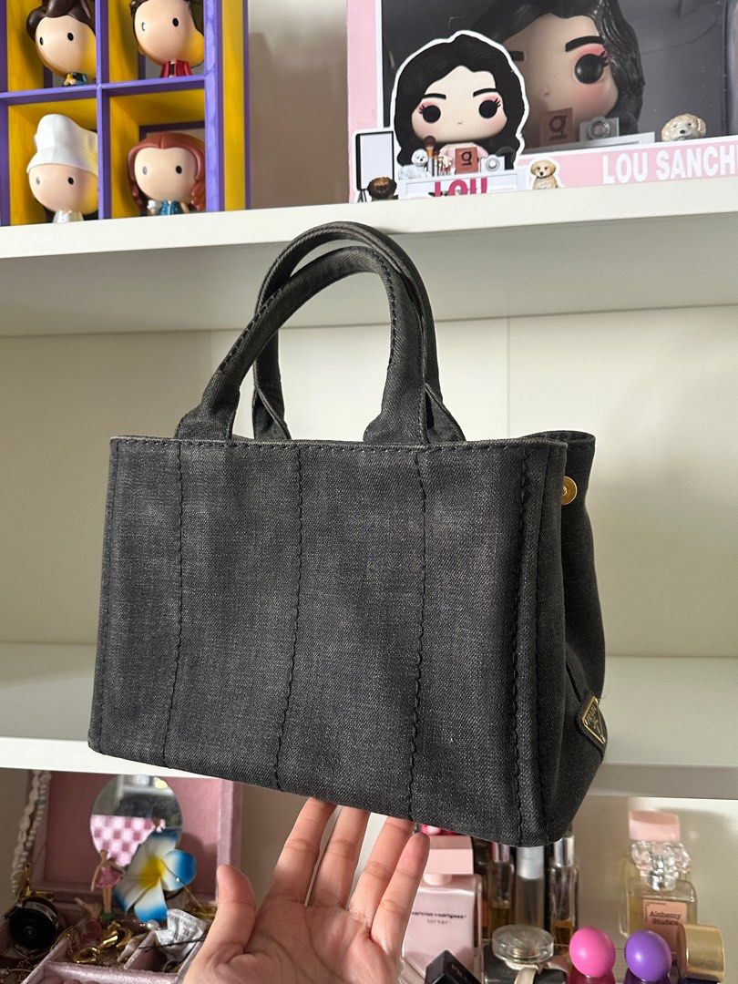 REPRICED Prada Canapa Denim Small (Category: Luxury Bags & Wallets) located in Quezon City. Submitted by makeupmatcha (Listing ID 1406836650, Image 2). Description: Complete with dustbag, card, and strap Bought from Sizzy Maricar on IG (Japan based) for 35k Probably need cleaning No flaws and problems SDD via Lalamove/Grab Can do meetup + transpo fee from North QC.