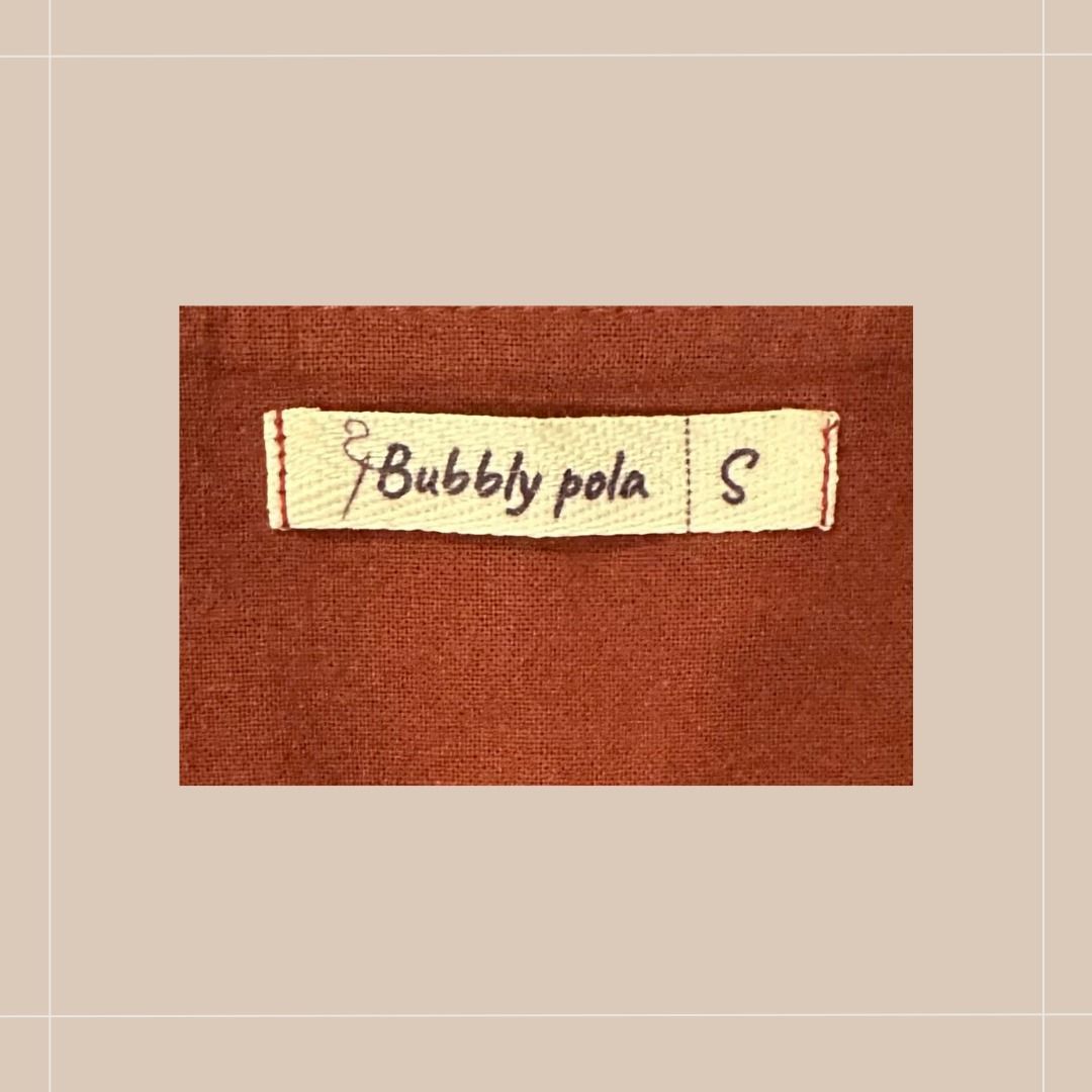 Pre-loved Bubbly Pola Wrap Top - Size S (Category: Blouses) located in Quezon City. Submitted by simpleretiree (Listing ID 1406865376, Image 3). Description: This pre-loved Bubbly Pola wrap top was lightly used, looking almost like new. It is in excellent condition, with the following features: - Design: Flutter sleeves, tie closure - Color: Rusty-colored - Actual measurements: *Waist 25.5 (on the mannequin), but this is flexible (maybe up to 36"