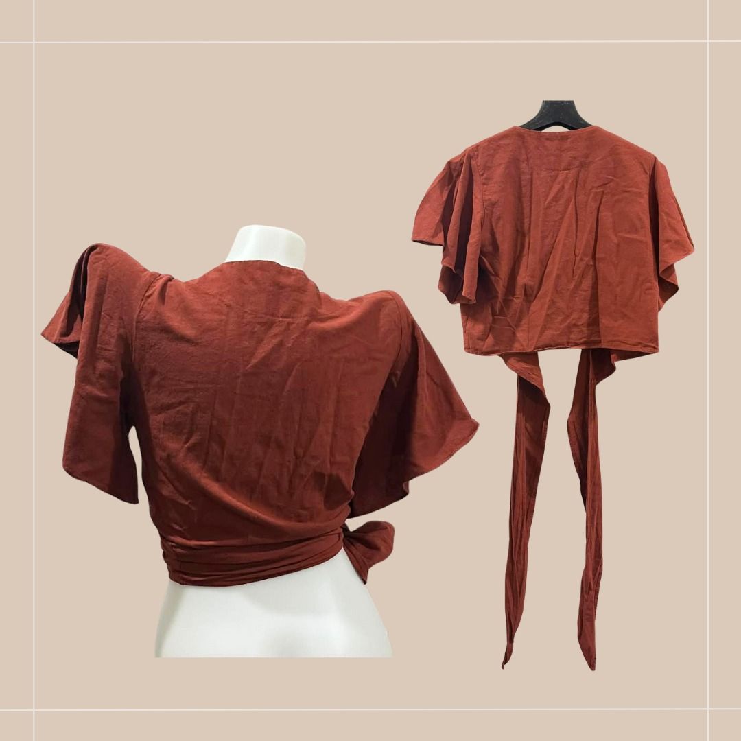 Pre-loved Bubbly Pola Wrap Top - Size S (Category: Blouses) located in Quezon City. Submitted by simpleretiree (Listing ID 1406865376, Image 2). Description: This pre-loved Bubbly Pola wrap top was lightly used, looking almost like new. It is in excellent condition, with the following features: - Design: Flutter sleeves, tie closure - Color: Rusty-colored - Actual measurements: *Waist 25.5 (on the mannequin), but this is flexible (maybe up to 36"