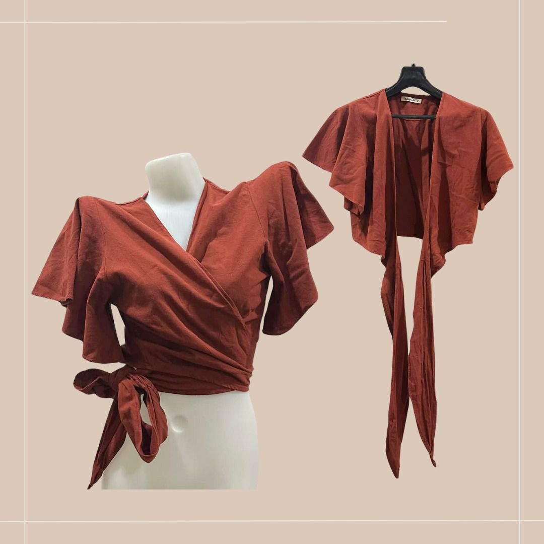 Pre-loved Bubbly Pola Wrap Top - Size S (Category: Blouses) located in Quezon City. Submitted by simpleretiree (Listing ID 1406865376, Image 1). Description: This pre-loved Bubbly Pola wrap top was lightly used, looking almost like new. It is in excellent condition, with the following features: - Design: Flutter sleeves, tie closure - Color: Rusty-colored - Actual measurements: *Waist 25.5 (on the mannequin), but this is flexible (maybe up to 36"