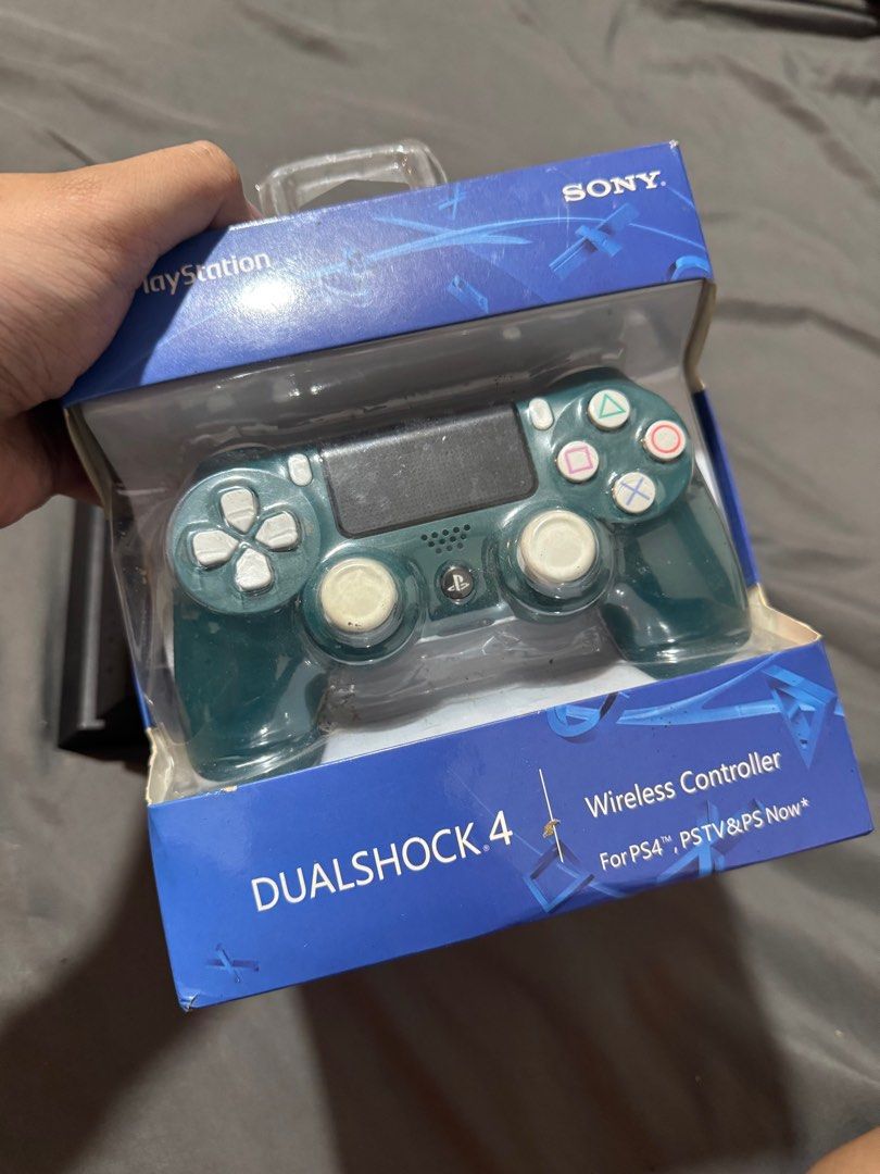 PS4 Phat 1TB with 1 controller and 2 games (Category: PlayStation) located in Pasig City. Submitted by robbiseraphin (Listing ID 1406931839, Image 2). Description: Selling: PS4 Phat 1TB with 1 controller (box) + 2 games (pasig located) - 1 OEM controller (kasama box) - 2 cd games - complete wires - 13.02 firmware - sealed = 5.5k php —————— PM or text at 09150578164 if may tanong.