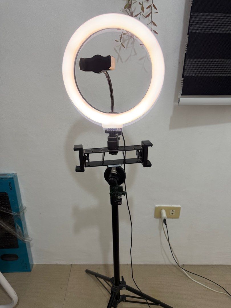 Ring Light (Category: Lighting & Studio Equipment) located in Cavite. Submitted by jam90053 (Listing ID 1406889017, Image 3). Description: - Ring Light with Brand New Mic - Perfect for content creation - Adjustable brightness and color temperature - Includes a sturdy stand - Comes with a phone holder yung ringlight lang ang well used kaya don't expect na bago pa pero yung mic niya never use.