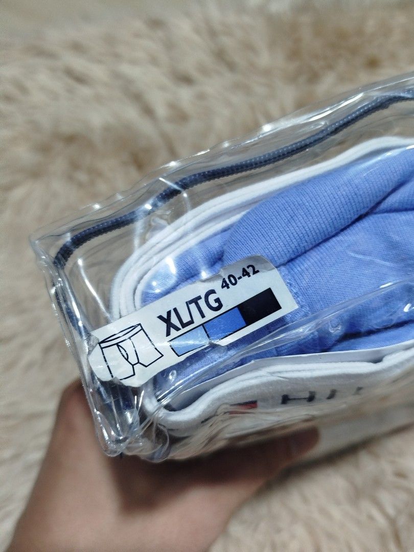 Tommy Hilfiger 3-Pack Boxer Briefs XL (Category: Underwear) located in Taguig. Submitted by giango1313 (Listing ID 1406911258, Image 3). Description: - Tommy Hilfiger 3-pack boxer briefs - Colors: Blue and White - Size: XL/TG (fits waist 40-42) - Condition: New, sealed in original packaging.