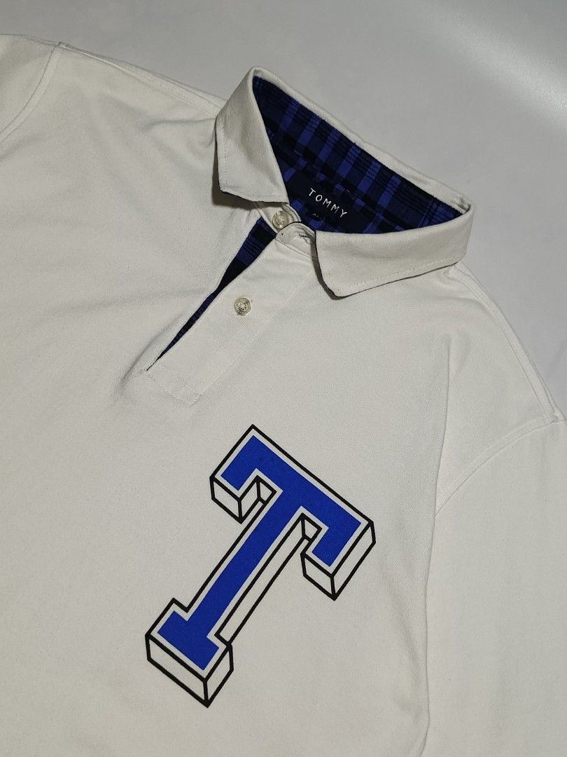 TOMMY HILFIGER Polo shirt (Category: Tshirts & Polo Shirts ) located in Manila. Submitted by deftzy (Listing ID 1406857815, Image 2). Description: MEDIUM on tag W19 x L27.5 No issue Good as new condition.