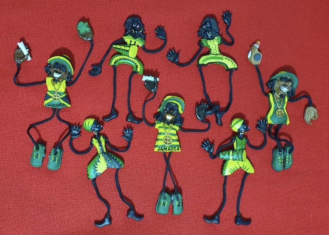 Vintage Jamaican Ref Magnet (Category: Vintage Collectibles) located in Taytay. Submitted by armyborahe21 (Listing ID 1406863366, Image 1). Description: - Set of Jamaican-themed figurines. - Features vibrant yellow, green, and black colors. - Each figurine has a unique design. - Articulated arms and legs. - Some figurines include accessories. - 500 each - Perfect for collectors and unique decor..
