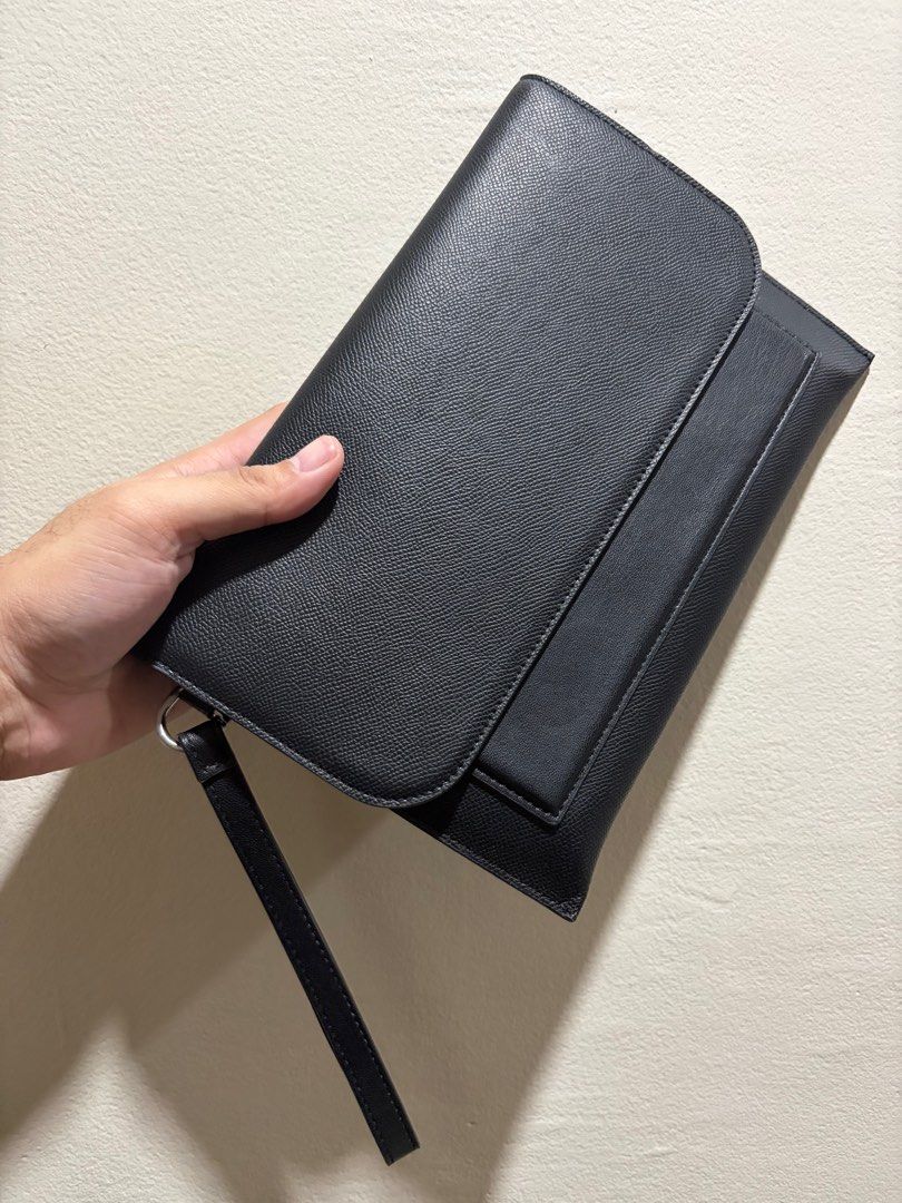 Zara Flap Clutch (Category: Belt bags, Clutches and Pouches) located in Cebu City. Submitted by ronhern (Listing ID 1406933128, Image 1). Description: Leather Flap Clutch with zipper inside. Has a zipper compartment inside as well and key holder. Used only less than 10 times. Originally bought for 1,795 pesos. RFS: not in use..