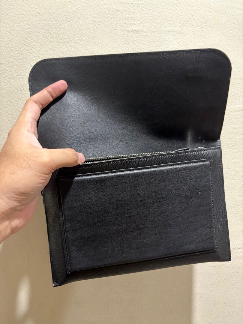 Zara Flap Clutch (Category: Belt bags, Clutches and Pouches) located in Cebu City. Submitted by ronhern (Listing ID 1406933128, Image 2). Description: Leather Flap Clutch with zipper inside. Has a zipper compartment inside as well and key holder. Used only less than 10 times. Originally bought for 1,795 pesos. RFS: not in use..