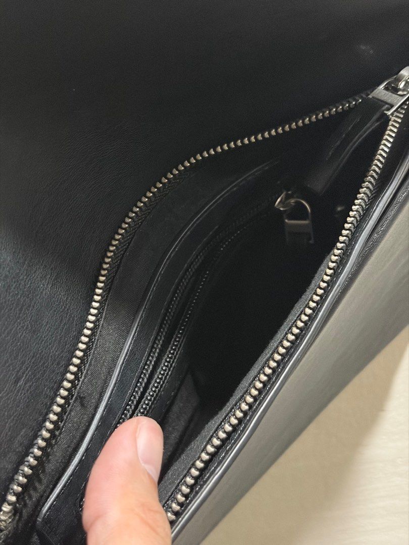 Zara Flap Clutch (Category: Belt bags, Clutches and Pouches) located in Cebu City. Submitted by ronhern (Listing ID 1406933128, Image 3). Description: Leather Flap Clutch with zipper inside. Has a zipper compartment inside as well and key holder. Used only less than 10 times. Originally bought for 1,795 pesos. RFS: not in use..