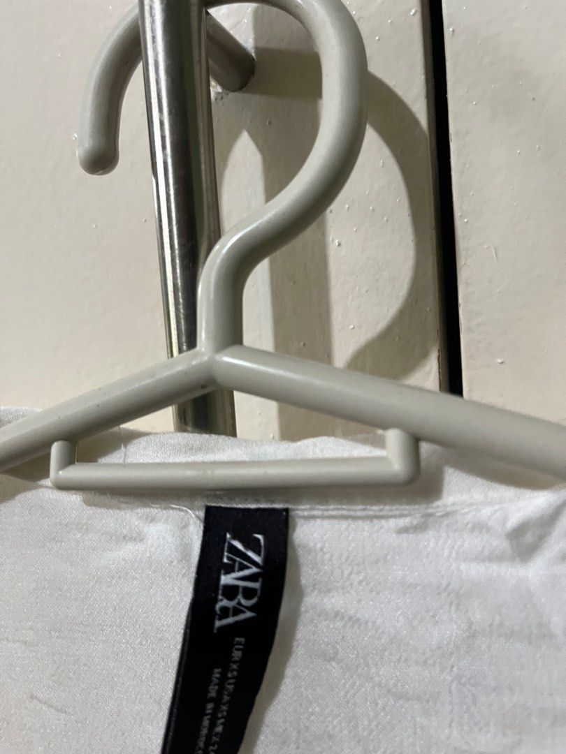 Zara White Long Sleeve Shirt (Category: Longsleeves) located in Marikina City. Submitted by moonchok (Listing ID 1406889544, Image 2). Description: - Zara white long sleeve shirt - Collared neckline - Two front pockets - Button-down closure - Long sleeves with cuffs - Lightweight fabric - worn twice - super comfy! - needs iron.