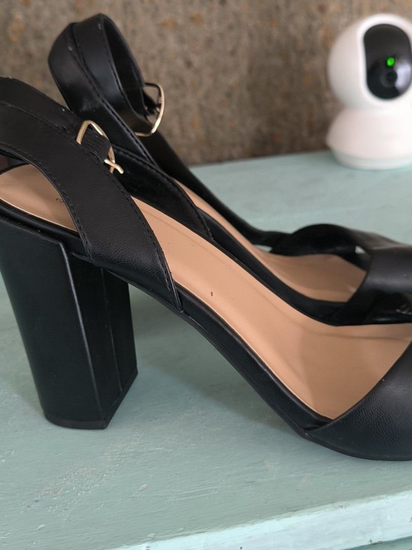 A New Day Black Block Heel Sandals (Category: Flats & Sandals) located in Manila. Submitted by hannie10 (Listing ID 1401935033, Image 3). Description: Black sandals from A New Day with a block heel. Features an ankle strap with a buckle closure. The sandals have a square toe design. The size is 9.5. The soles are black with a textured pattern. The insole is a light tan color. A New Day brand size 9.5 color black new 800.