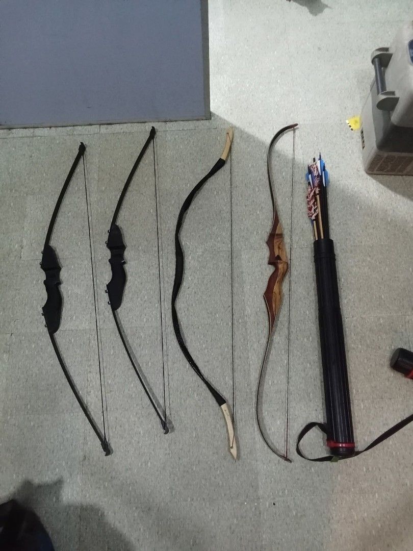 Archery Bows and Arrows Set AS IS for take all (Category: Other Sports Equipment and Supplies) located in Pasig City. Submitted by akichiro (Listing ID 1402080204, Image 2). Description: -bows and arriws lightly used, only been stock for ages - Archery set with multiple bows - Bows in various designs and colors (black, wood) - Includes a black quiver - Perfect for archery enthusiasts and beginners..