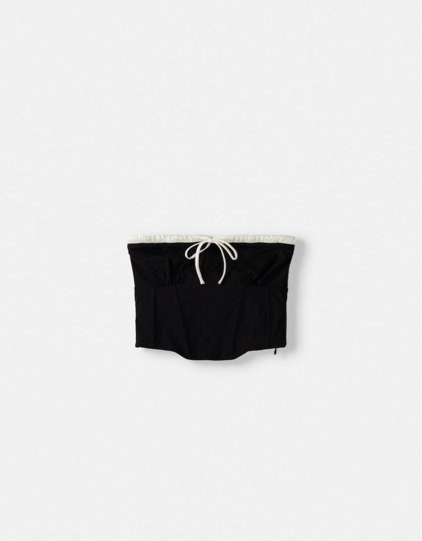 Bershka Black Corset Top (Category: Sleeveless) located in Manaoag. Submitted by love.abgl (Listing ID 1401956885, Image 2). Description: - Bershka black corset top - Strapless design - White trim detail - Tie front - Boning details - Size: S .