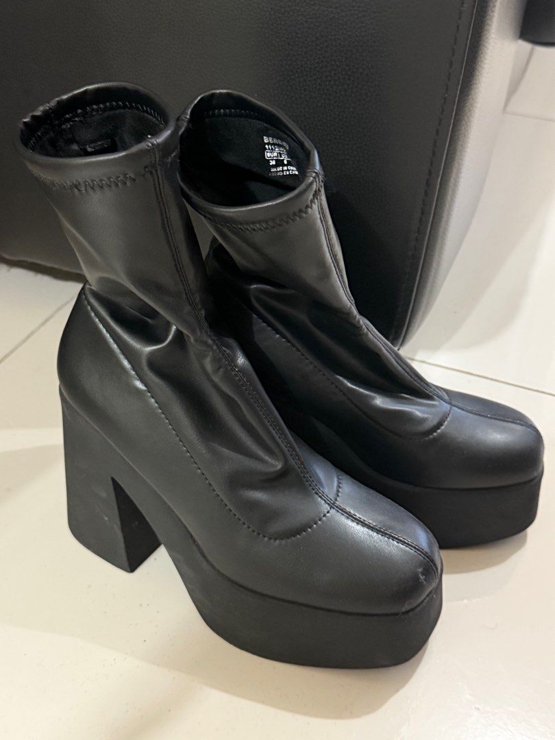 Bershka Fitted High-Heel Platform Ankle Boots (Category: Boots) located in Taguig. Submitted by fitted.ph (Listing ID 1401998011, Image 1). Description: - Bershka ankle boots - Black, fitted design - High-heel platform - Chunky heel and platform sole - Modern and sleek style - Suitable for various outfits - Original price: ₱2,995.00.