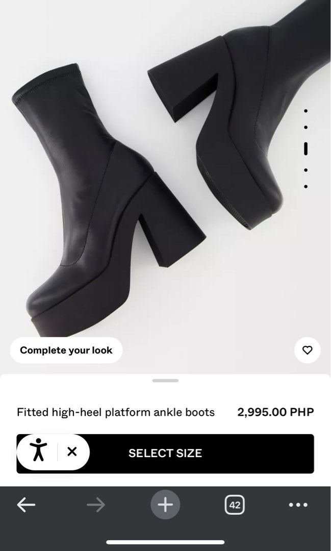 Bershka Fitted High-Heel Platform Ankle Boots (Category: Boots) located in Taguig. Submitted by fitted.ph (Listing ID 1401998011, Image 3). Description: - Bershka ankle boots - Black, fitted design - High-heel platform - Chunky heel and platform sole - Modern and sleek style - Suitable for various outfits - Original price: ₱2,995.00.