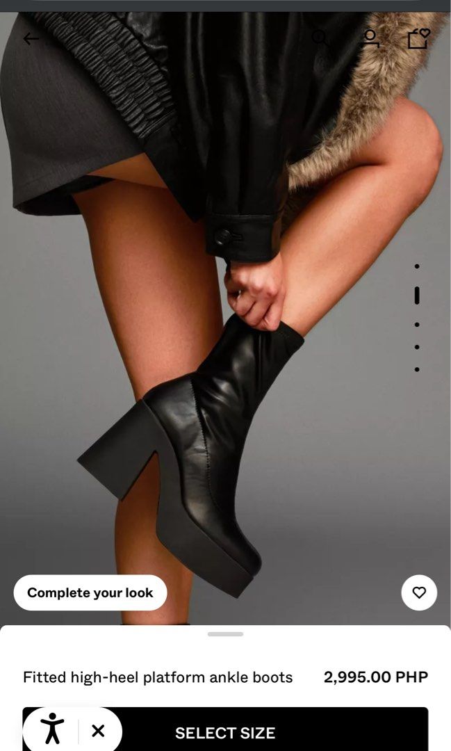 Bershka Fitted High-Heel Platform Ankle Boots (Category: Boots) located in Taguig. Submitted by fitted.ph (Listing ID 1401998011, Image 2). Description: - Bershka ankle boots - Black, fitted design - High-heel platform - Chunky heel and platform sole - Modern and sleek style - Suitable for various outfits - Original price: ₱2,995.00.