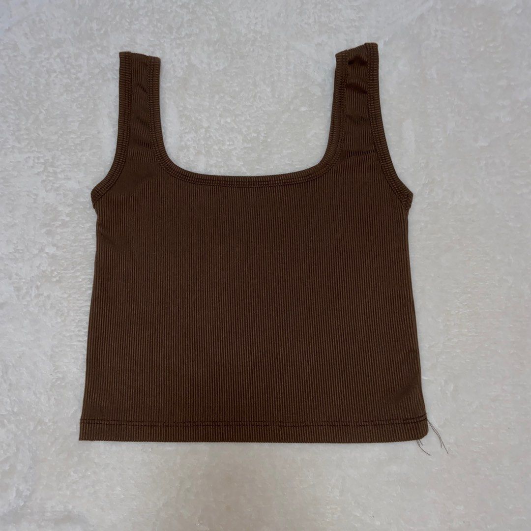 Brown Ribbed Tank Top (Category: Sleeveless) located in Manila. Submitted by sshshm (Listing ID 1402020004, Image 1). Description: Brown ribbed tank top. Square neckline. Wide straps. Cropped length. Soft, stretchy fabric. DM to inquire..