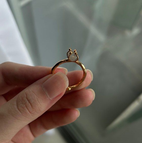 Bumi Ring (Category: Rings) located in Singapore. Submitted by bamzcrft (Listing ID 1401978921, Image 2). Description: - got it as a gift but not my style so hopefully can sell it to someone else who better appreciates - screenshot of the listing is a reference, I’m not sure what stone it is but it’s definitely the same style and concept - brand new, comes with packaging - negotiable for fast deals .