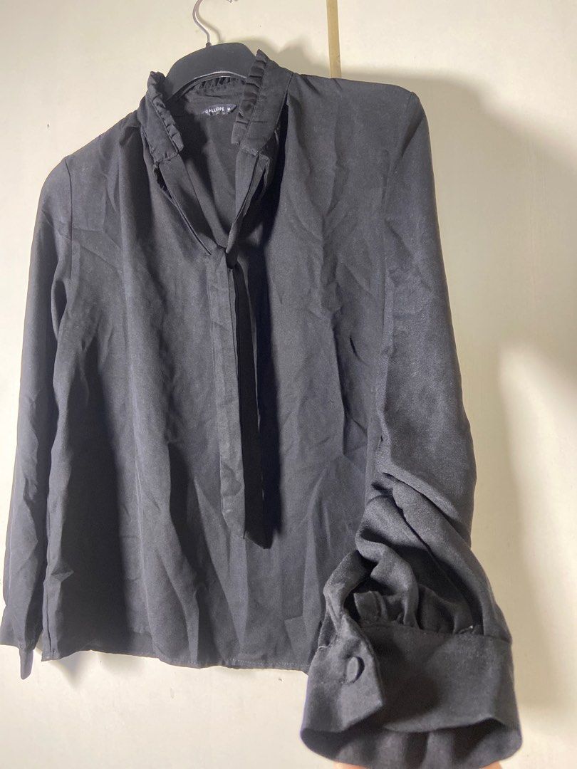 Calliope Black Blouse - Size M (Category: Blouses) located in Batangas. Submitted by dnd_declutter (Listing ID 1401962630, Image 3). Description: - Calliope black blouse - Size: M - Ruffled collar - Long sleeves with buttoned cuffs - V-neckline with tie detail - Plain back - Lightweight fabric « Prices are fixed & fair. -Please keep your expectations in check-Photos & descriptions show the exact condition per Carousell’s standards. « Questions wi
