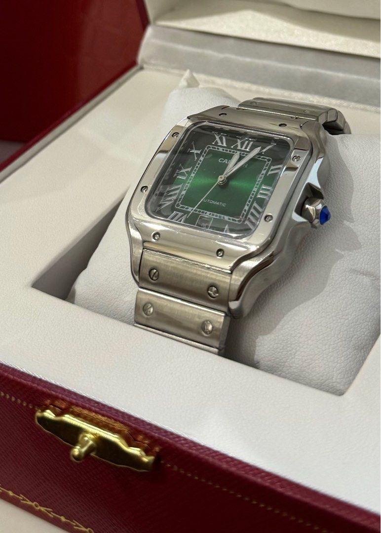 CARTIER GREEN SANTOS (Category: Luxury Watches) located in Dasmarinas. Submitted by ninadzn (Listing ID 1402075267, Image 2). Description: CARTIER SANTOS GREEN DIAL Medium 38mm Brand new full set Green Dial With box case, paper bag Good condition no issues at all Actual photos posted pm for sure buyers only !! still negotiable 📍Dasmariñas Cavite ✅ No refundable ✅ Meet up around dasma cavite .